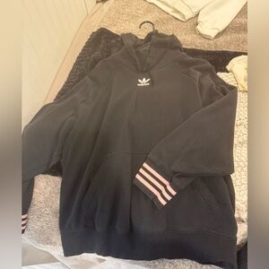 black adidas hoodie with pink details size medium